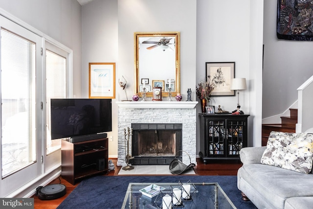 living room featuring hardwood / wood-style flooring and a fireplace