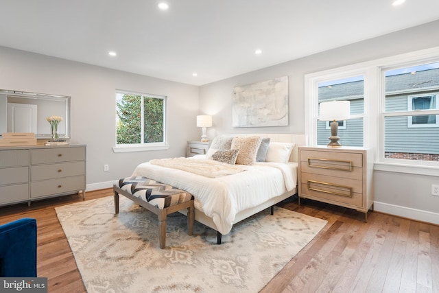 bedroom with light hardwood / wood-style floors