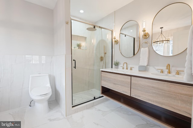 bathroom featuring toilet, an enclosed shower, tile walls, vanity, and a notable chandelier