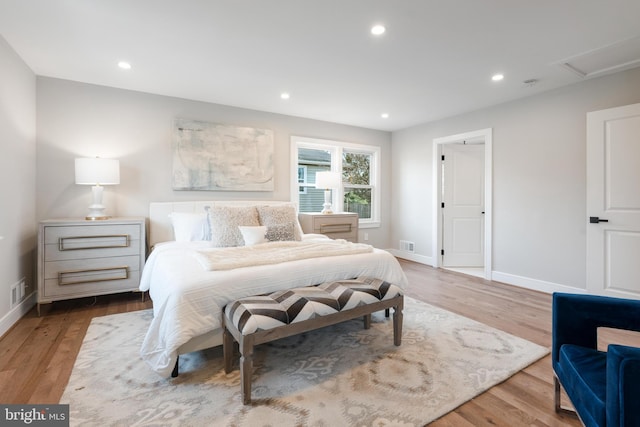 bedroom featuring light hardwood / wood-style flooring