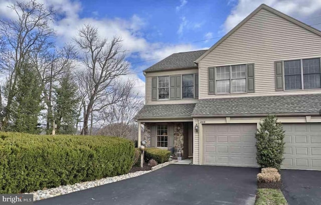 view of front of house with a garage