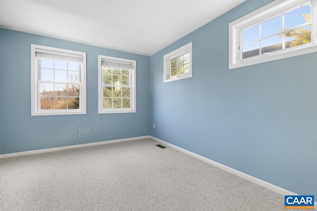 view of carpeted spare room