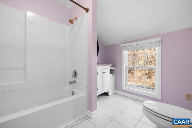 full bathroom featuring vanity, lofted ceiling, toilet, and washtub / shower combination