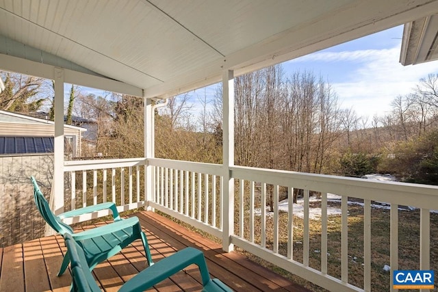 wooden deck featuring a porch