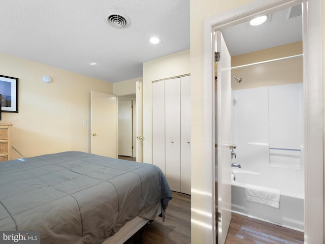 bedroom featuring hardwood / wood-style floors