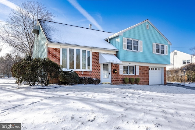 tri-level home featuring a garage