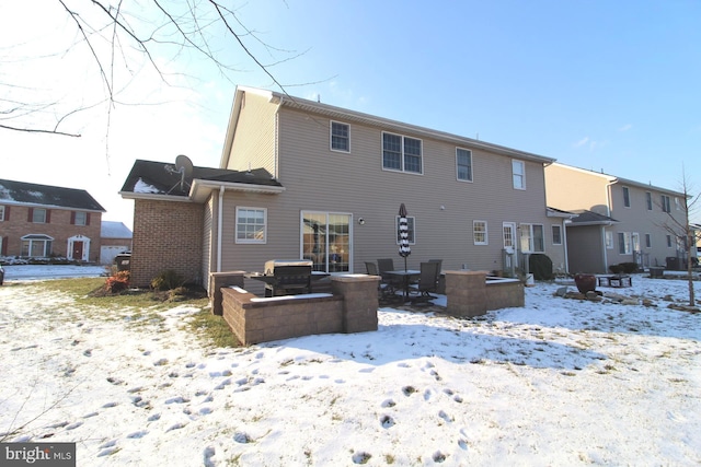 view of snow covered property