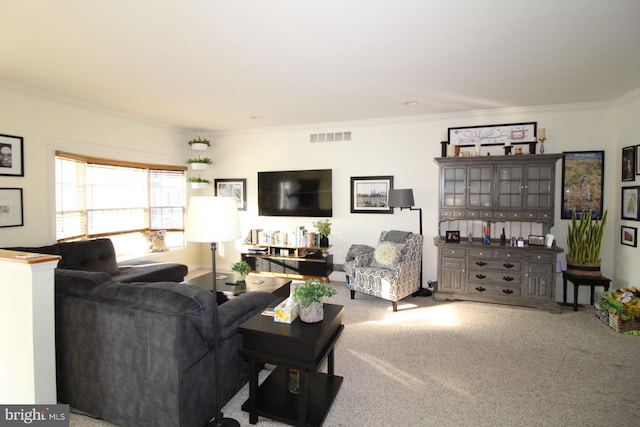 carpeted living room with crown molding