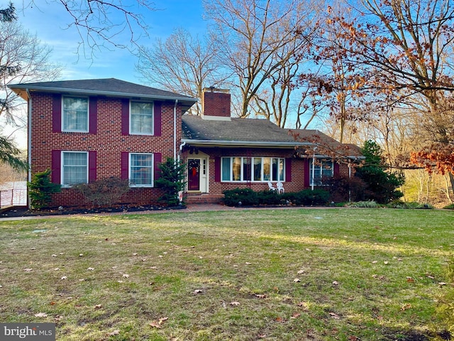 view of front of home with a front yard