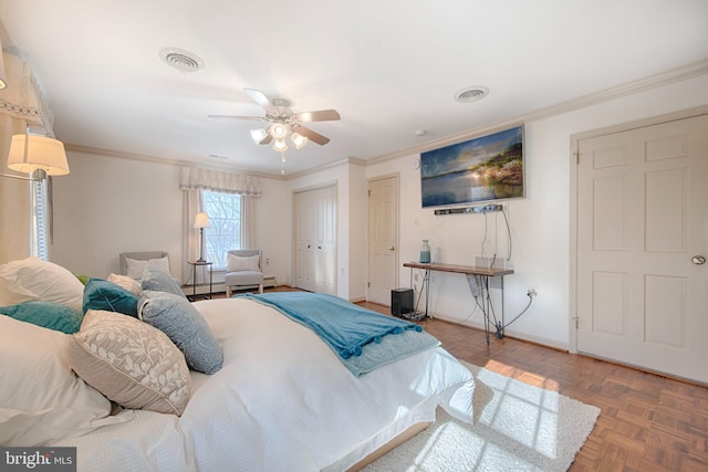 bedroom featuring ceiling fan, parquet flooring, and ornamental molding