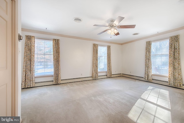 carpeted empty room featuring ornamental molding and ceiling fan