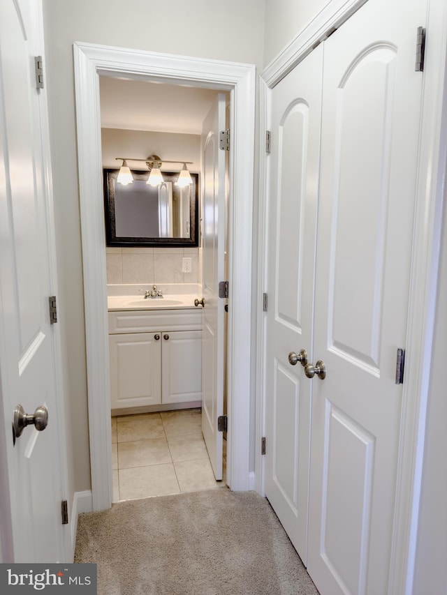 bathroom featuring vanity and tile patterned flooring