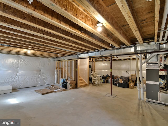 unfinished basement with stairs