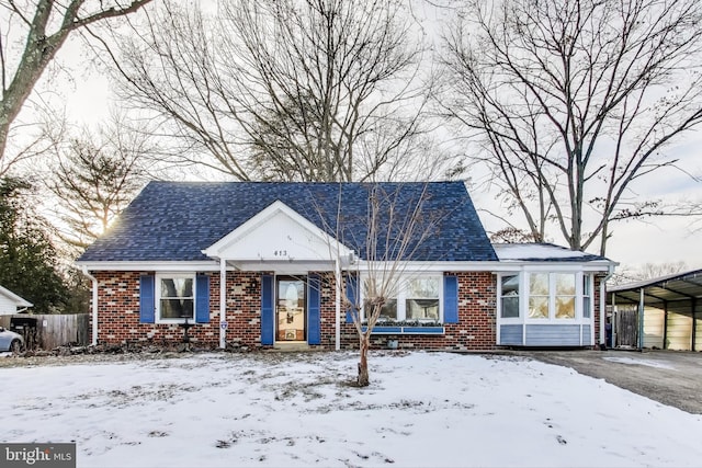 view of front of house with a carport