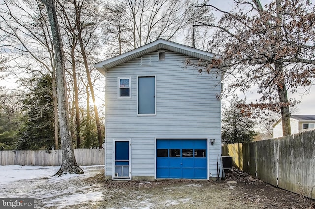 exterior space featuring a garage