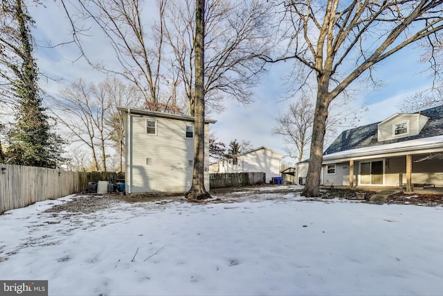 view of yard covered in snow