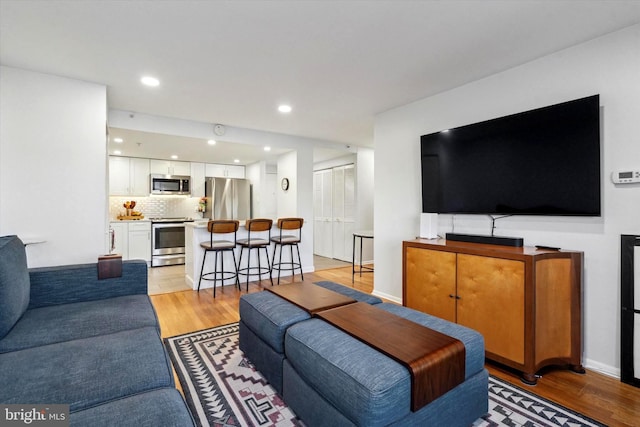 living room featuring light wood-type flooring