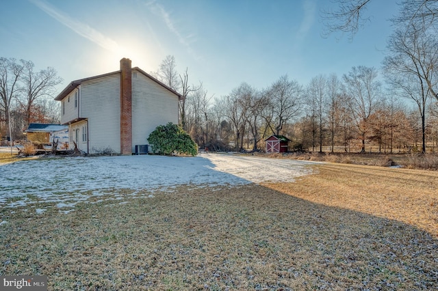 view of yard with central AC