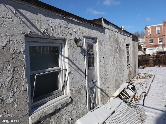 view of snow covered property