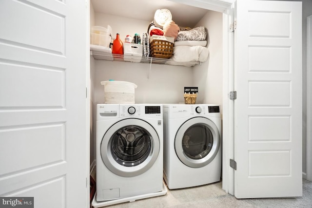 laundry room featuring washer and dryer