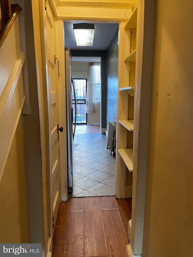 hall featuring hardwood / wood-style flooring