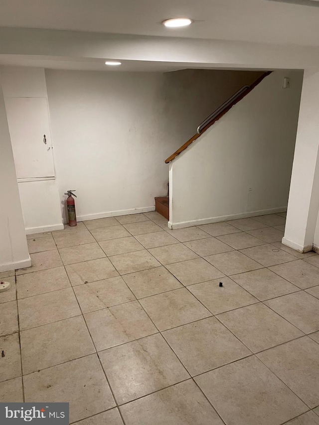 interior space with light tile patterned floors