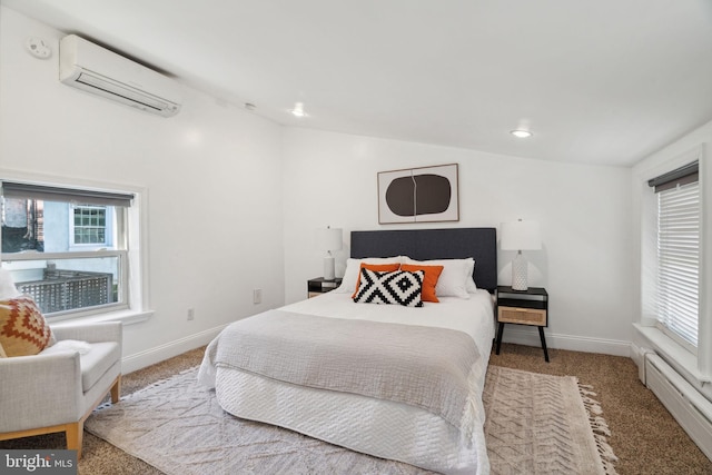 carpeted bedroom with vaulted ceiling, a baseboard heating unit, and a wall mounted AC