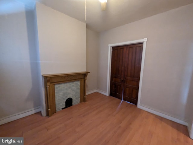 unfurnished living room with hardwood / wood-style floors