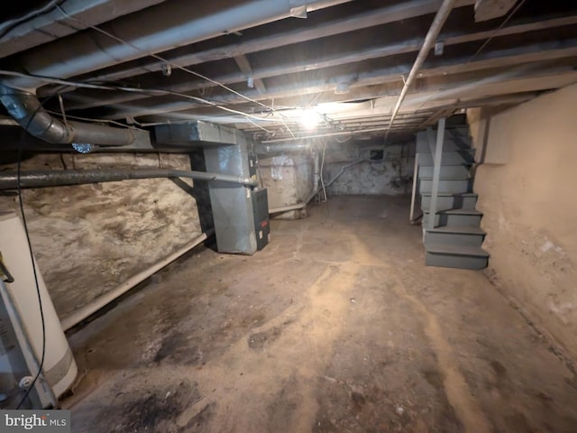 basement featuring heating unit