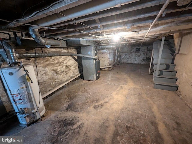 basement with heating unit and gas water heater