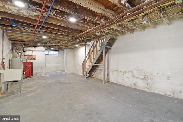 basement featuring water heater