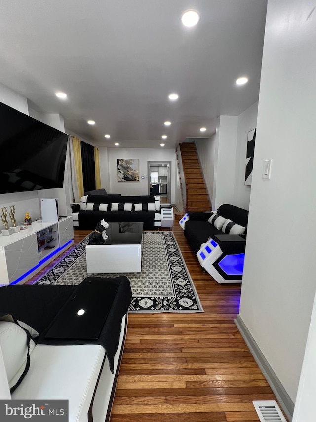 living room with hardwood / wood-style floors