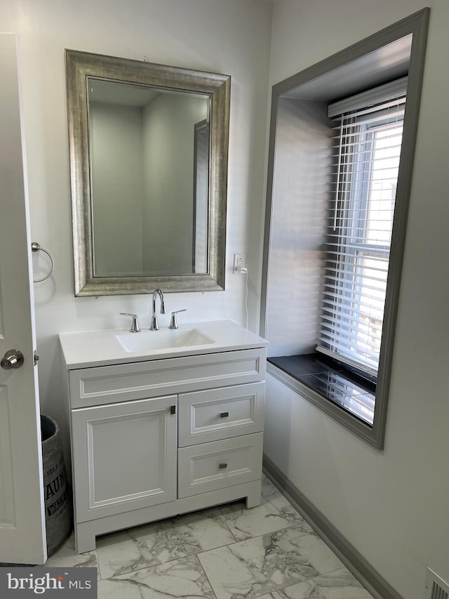 bathroom featuring vanity