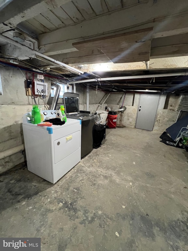 basement featuring separate washer and dryer