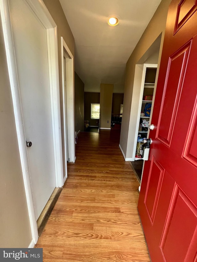 398 Harry S Truman Dr, Upper Marlboro, MD 20774 - corridor with light wood finished floors, baseboards, and recessed lighting