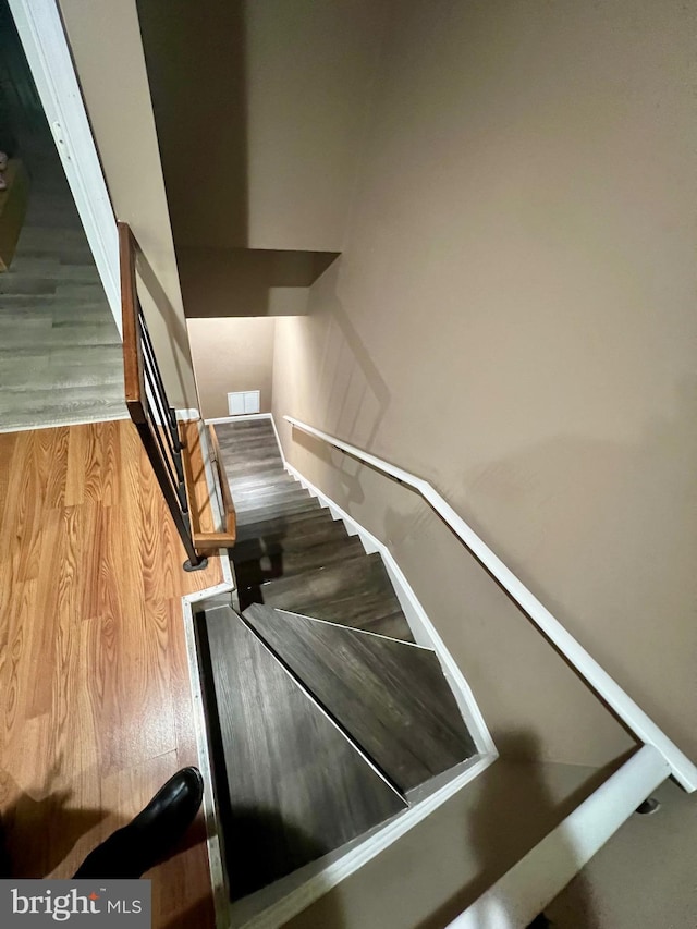 398 Harry S Truman Dr, Upper Marlboro, MD 20774 - staircase featuring wood finished floors