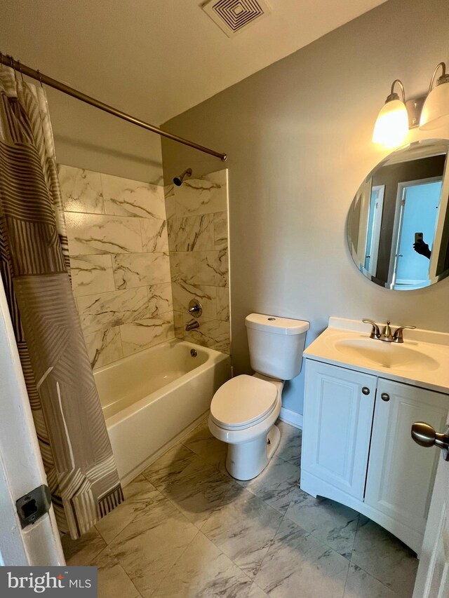 398 Harry S Truman Dr, Upper Marlboro, MD 20774 - full bath featuring marble look tile flooring, vanity, toilet, and shower / bath combo