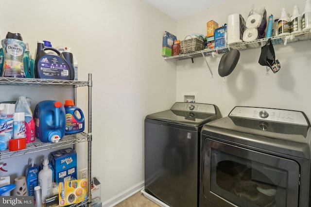 laundry area featuring washing machine and dryer