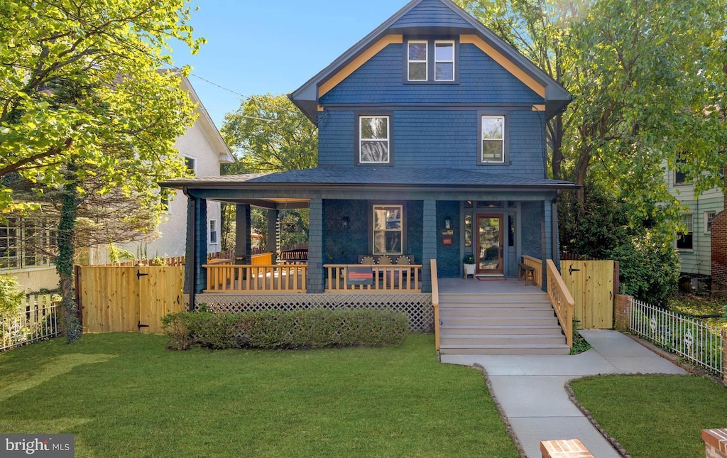 exterior space with a yard and covered porch