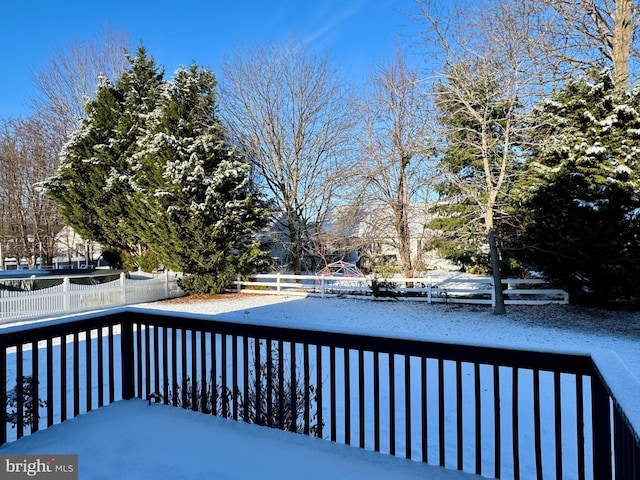 view of snow covered deck