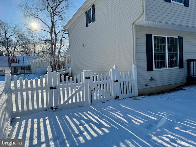 view of snow covered property