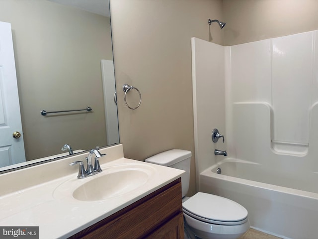 full bathroom with vanity, bathtub / shower combination, and toilet