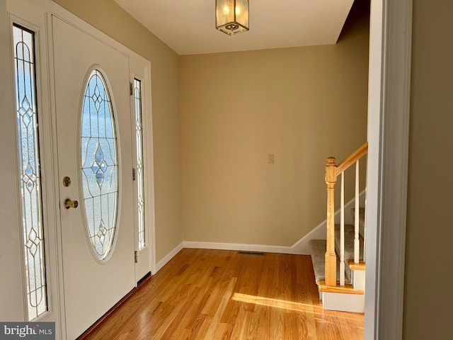 foyer with light hardwood / wood-style flooring