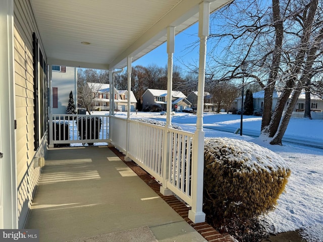 view of snow covered patio