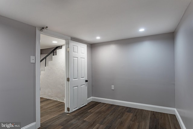 basement featuring dark wood-type flooring