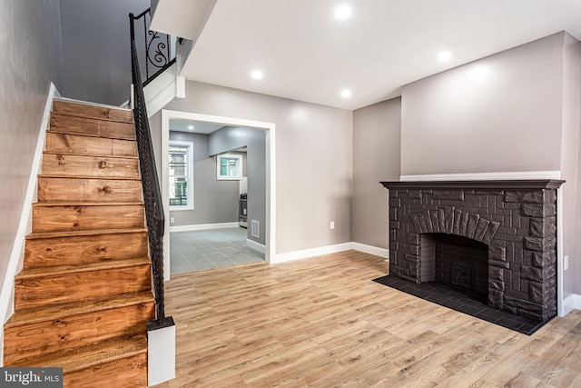 unfurnished living room featuring light hardwood / wood-style flooring