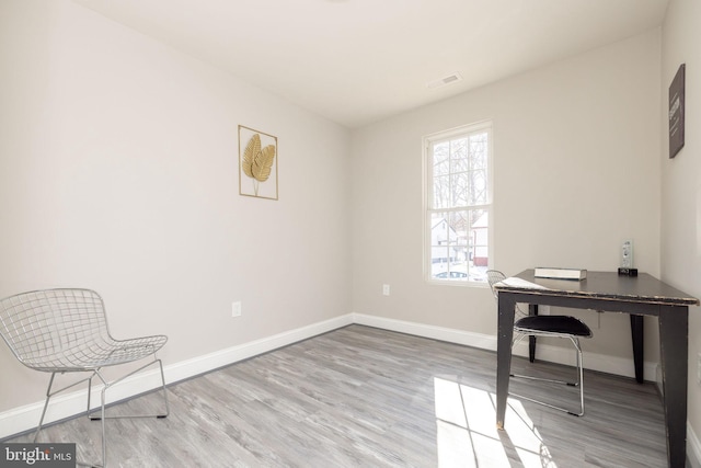 office space featuring light wood-type flooring