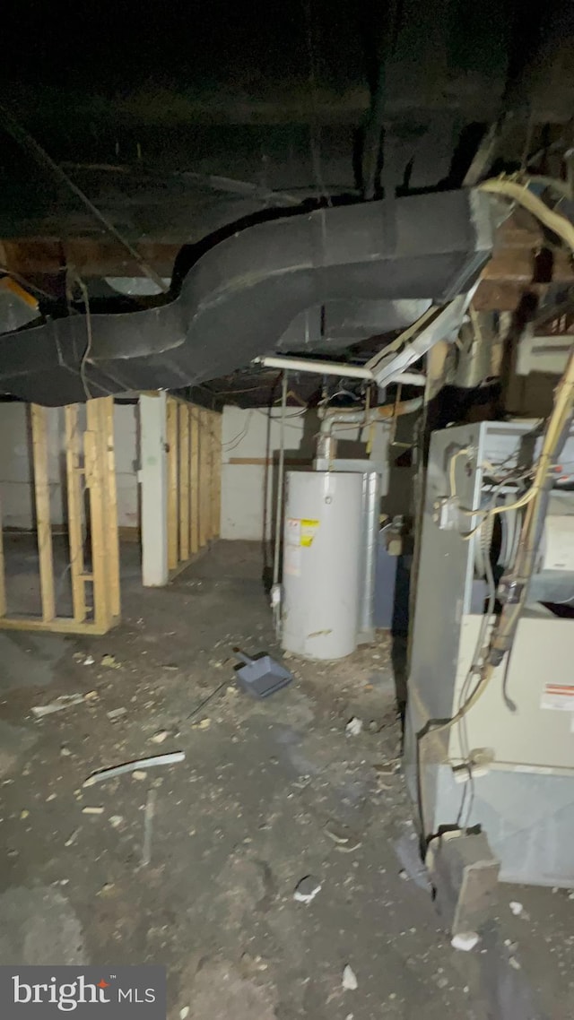 basement with heating unit and water heater