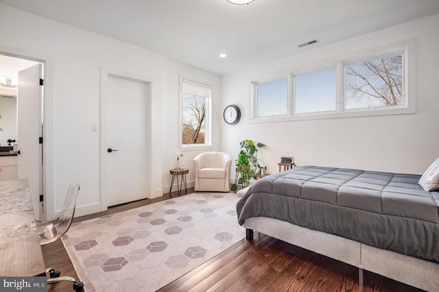 bedroom featuring wood-type flooring