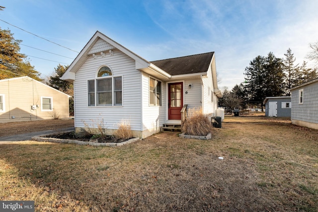 bungalow with a front yard